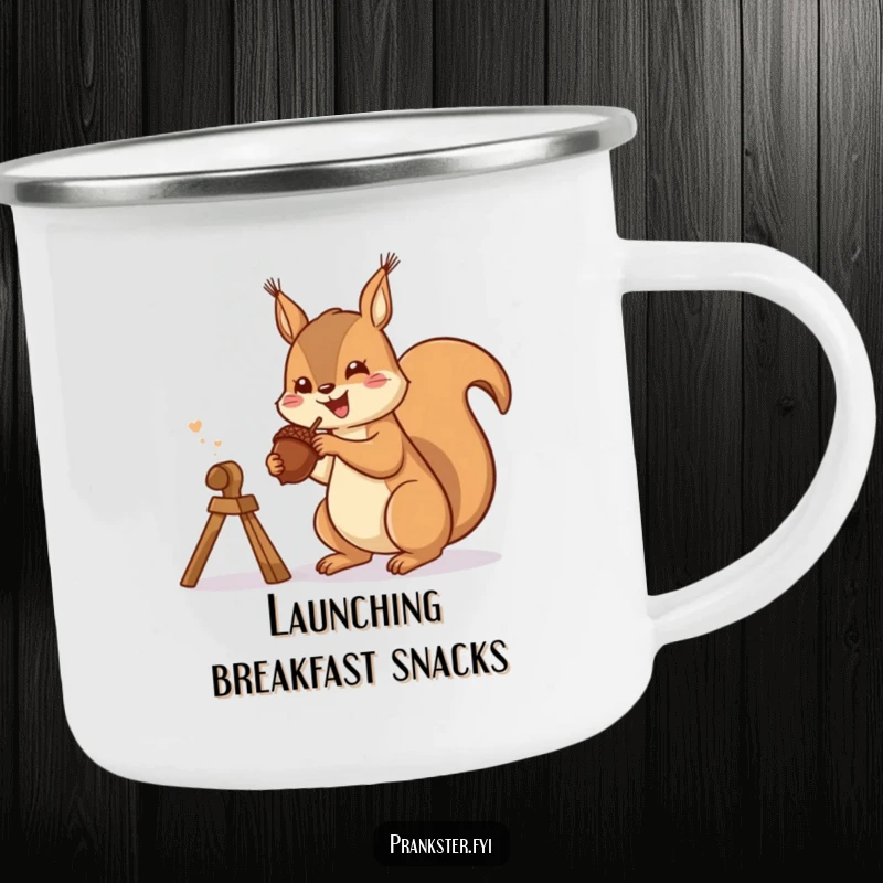 Funny camping mug with a gleeful squirrel launching an acorn from a slingshot, perfect for outdoor adventures.