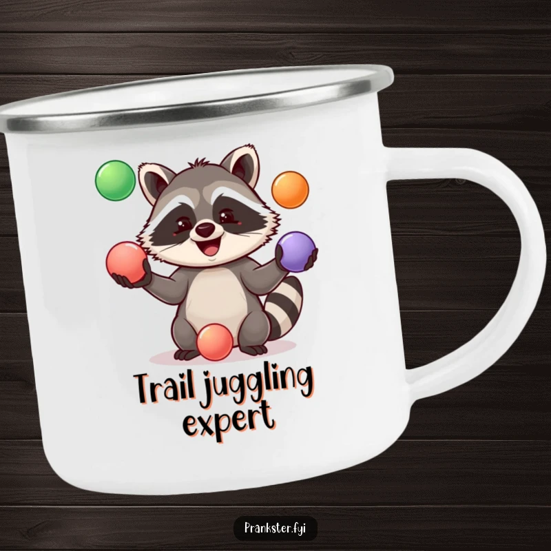 Funny Camping Mug showcasing a jolly raccoon juggling colorful balls, adding a playful touch to outdoor excursions.