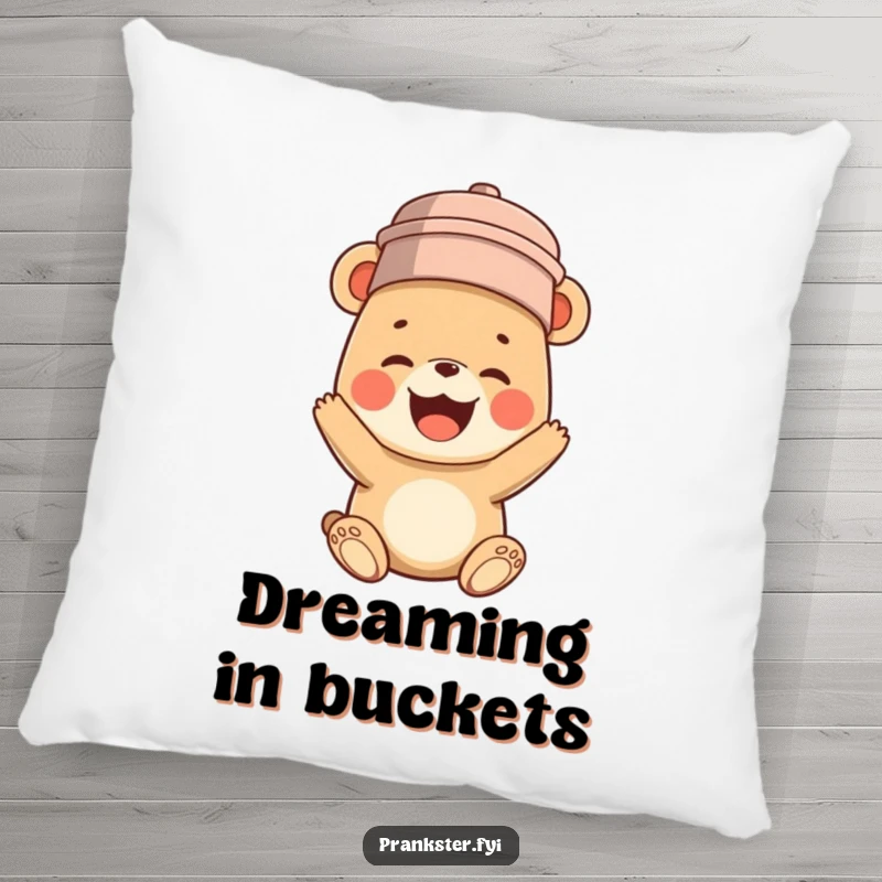 Funny pillow with a plush bear cub humorously wearing a bucket on its head, lost in its own hilarious, contagious giggles.