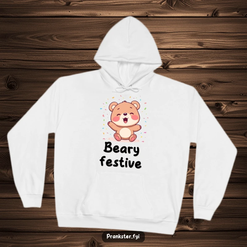 Funny hoodie with a delighted bear character joyfully playing with colorful confetti, offering warmth and a festive, humorous vibe.