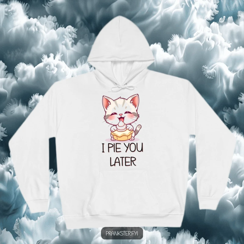Funny hoodie featuring a giggling kitten playfully aiming a cream pie, portraying adorable mischievousness.