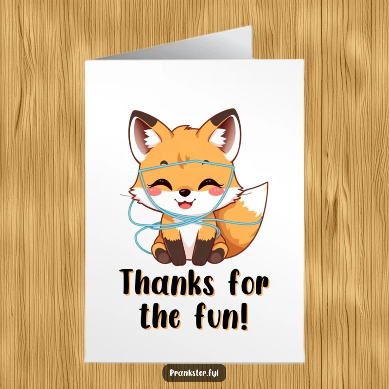 Funny Free Printable thank you card depicting a happy fox cub playfully entangled in silly string, conveying a lighthearted thank you.