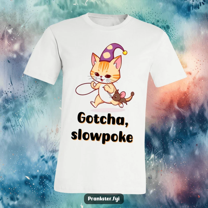 Funny jester cat t-shirt depicting a cat in a hat tripping a running mouse with a string, showcasing playful mischief.