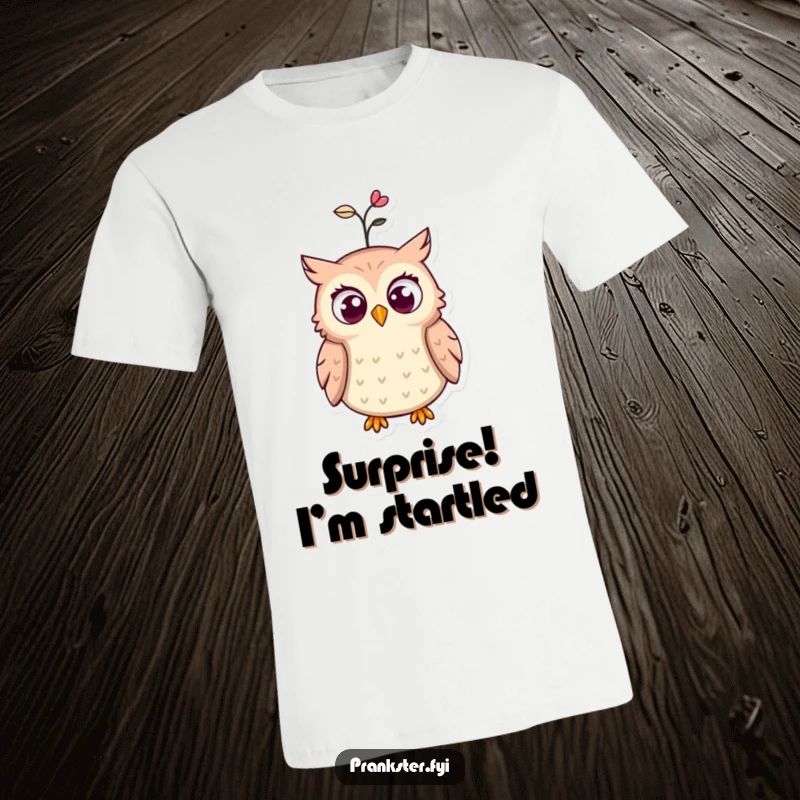 Funny t-shirt with a comically shocked owl, its eyes wide open as a spring springs out of its hat in a humorous display.