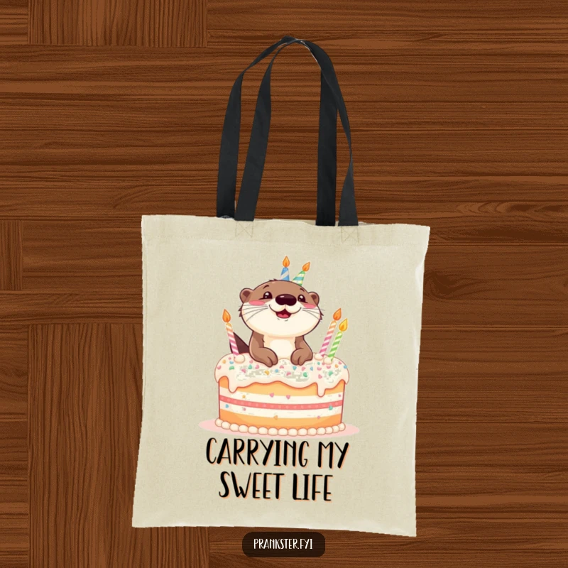 Funny tote bag showcasing a giggling otter popping out of a giant birthday cake, perfect for celebration essentials.
